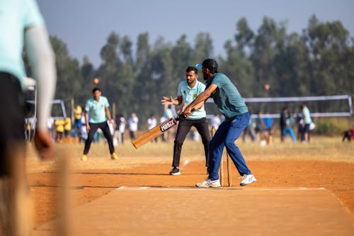 students playing cricket