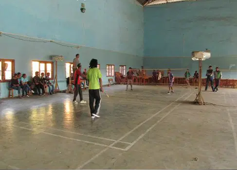 Students playing badminton 🏸