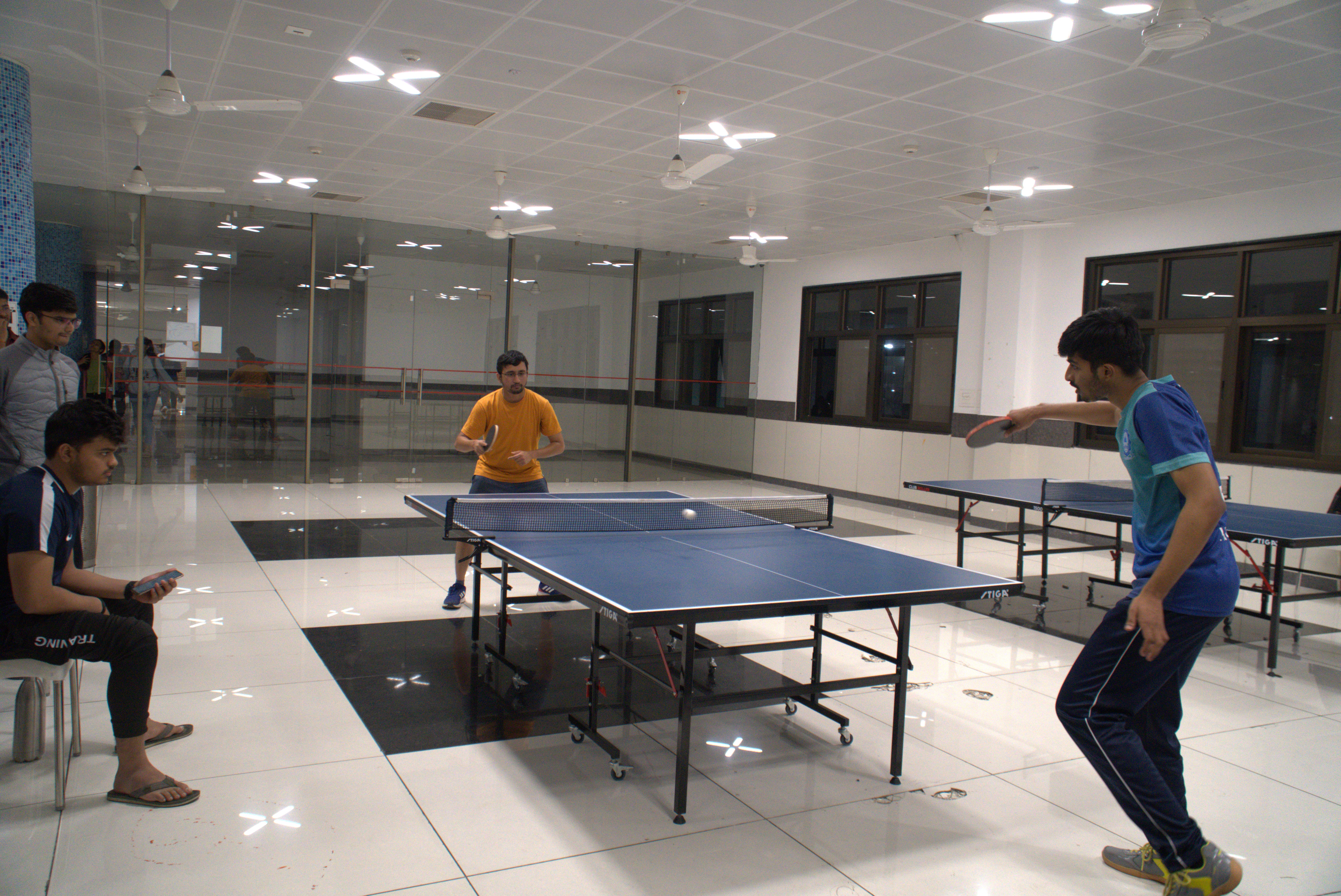 Students playing table tenis